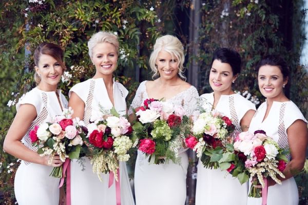 Bridesmaids And Bride With Bouquets